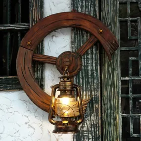 Coastal Kerosene Sconce: Clear Glass 1-Light Wall Mount Fixture in Brass with Wood Backplate