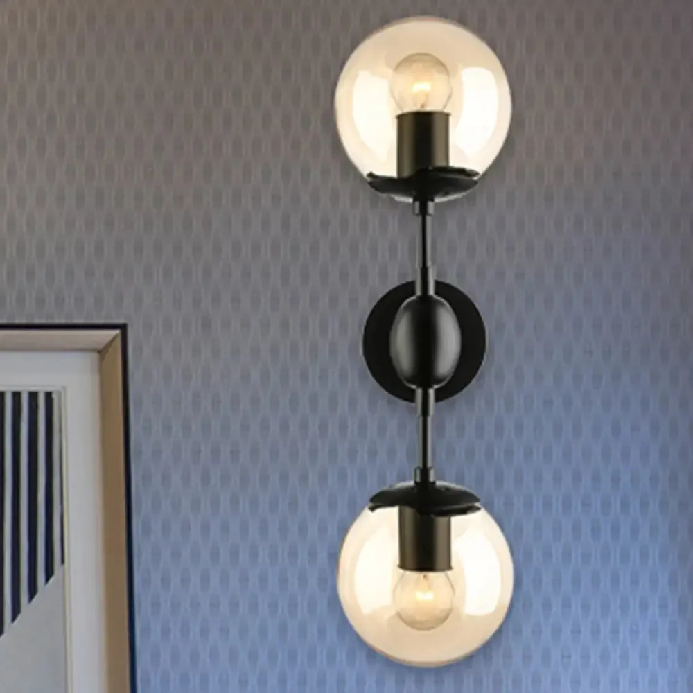 Industrial-style Black 2-Light Sconce with Amber Glass Globes - Perfect for Living Room Lighting