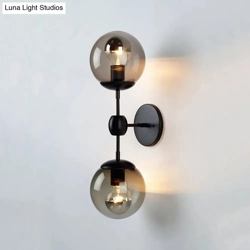 Industrial-style Black 2-Light Sconce with Amber Glass Globes - Perfect for Living Room Lighting