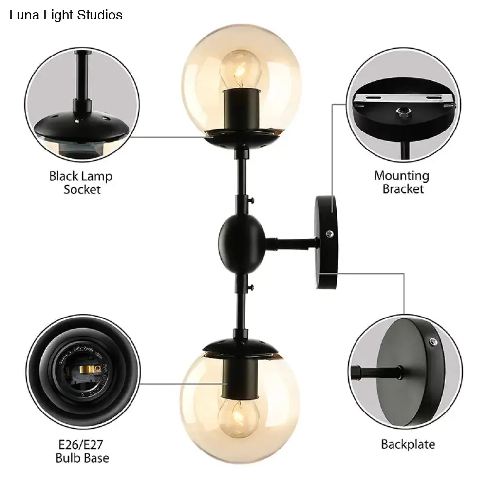 Industrial-style Black 2-Light Sconce with Amber Glass Globes - Perfect for Living Room Lighting